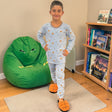 Boys pale blue pyjama set with a scattered mini print and basketball slippers