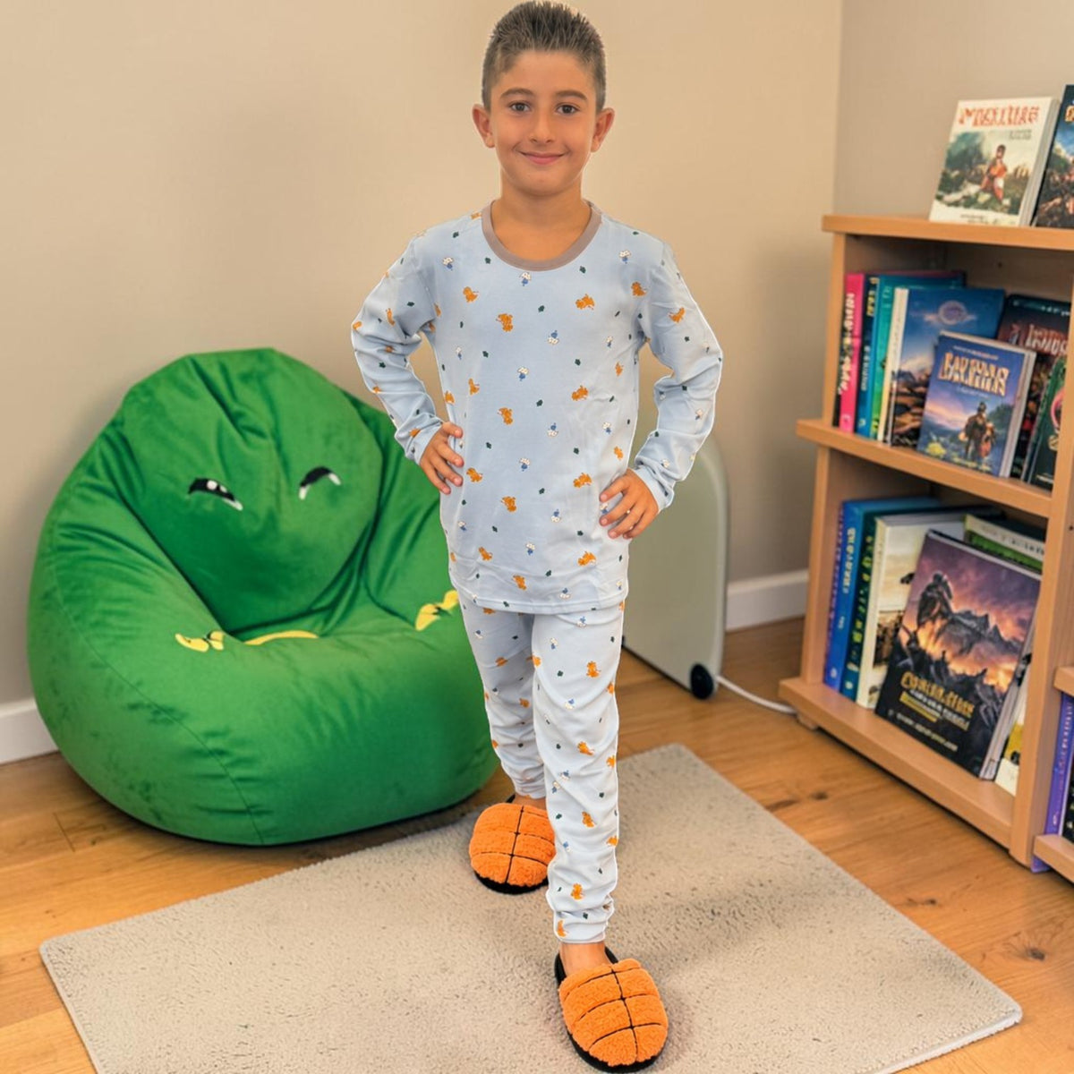 Boys pale blue pyjama set with a scattered mini print and basketball slippers