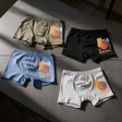 Four boys boxers in olive, black, blue and grey with an orange basketball print