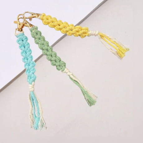 Braided macrame keychains in blue, green and yellow with tassels