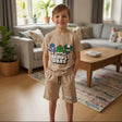 Beige boys set with a Brawl Stars characters tee and matching drawstring shorts, worn indoors