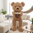 Caramel boucle teddy bear cradling a pearl dotted boba cup plush with a yellow straw, measured to 100cm