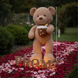 Caramel curly teddy bear holding a boba cup plush beside glowing letters