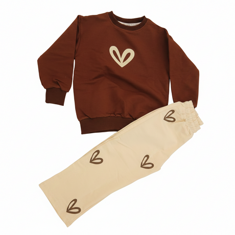 Brown sweatshirt and cream joggers laid flat showing the heart prints