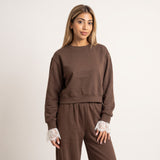 Cropped brown sweatshirt shown front on with lace trimmed sleeves