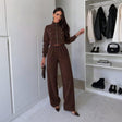 Brown military button cropped jacket and wide leg pants set worn in a walk in closet