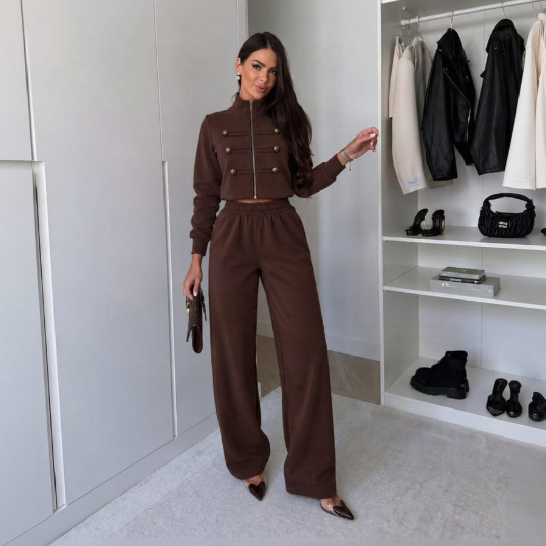 Brown military button cropped jacket and wide leg pants set worn in a walk in closet