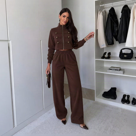 Brown military button cropped jacket and wide leg pants set worn in a walk in closet