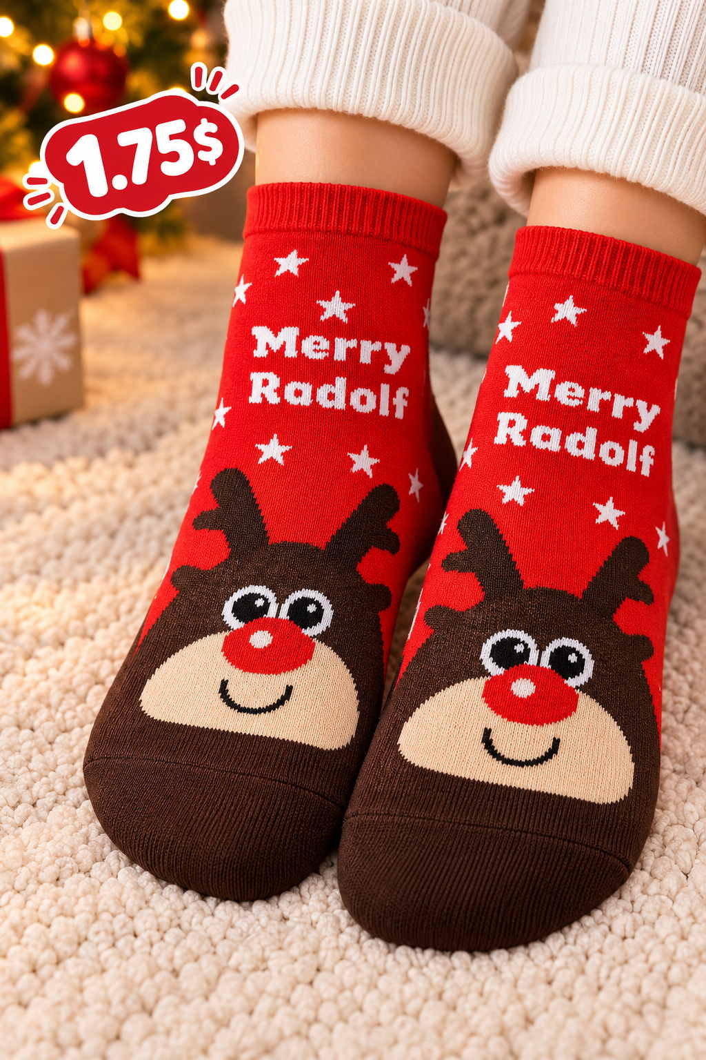 Red Christmas socks with Merry Radolf lettering and a brown reindeer face with a red nose on the foot