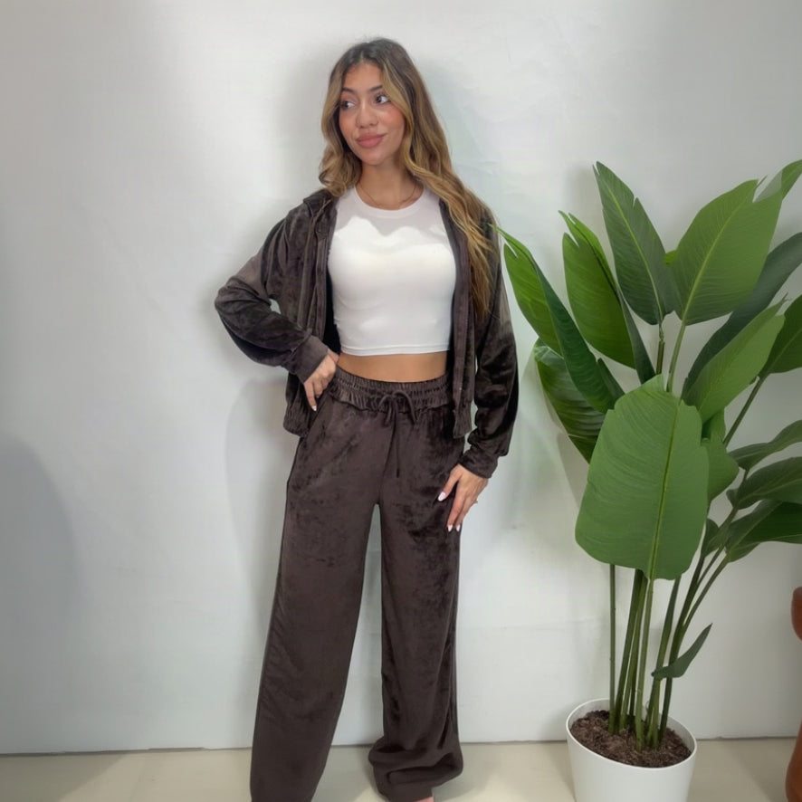 Brown velour hoodie worn open over a white crop top with matching drawstring wide leg pants