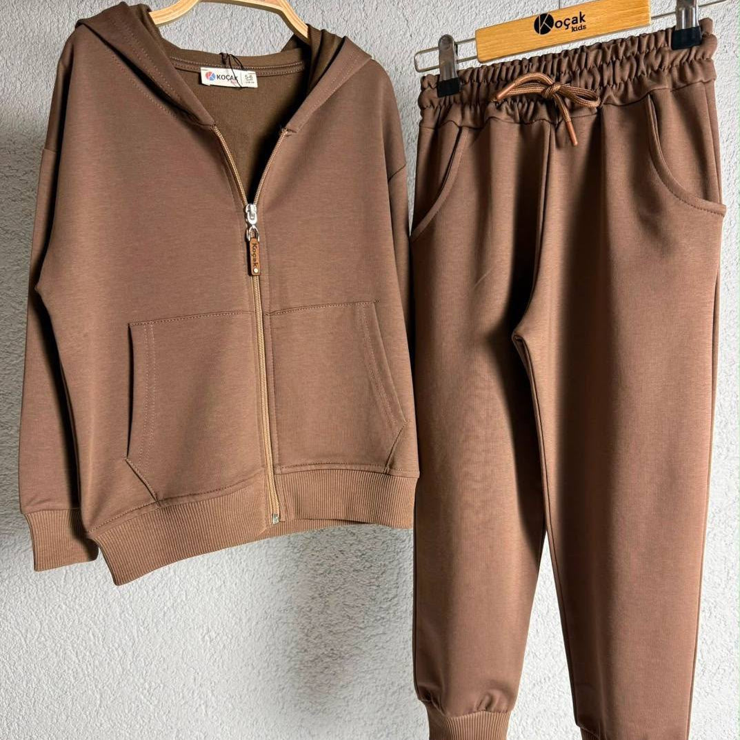 Brown zip hoodie and joggers on hangers