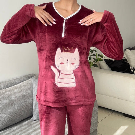 Close view of the burgundy pyjama top showing the three button placket