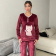 Burgundy fleece pyjama set with a pale pink crown cat applique and white piping