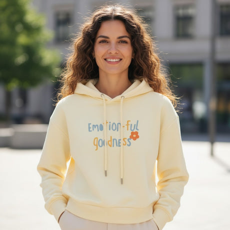 Woman in butter yellow hoodie with a blue and orange printed slogan, Jack Gifts Online Lebanon