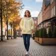 Woman in butter yellow zip hoodie with pink tassel drawstrings, Jack Gifts Online Lebanon