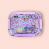 Lunch box with butterfly design on a beige background