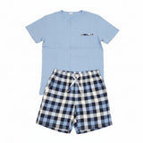 Light blue henley top with a pocket and blue checked shorts