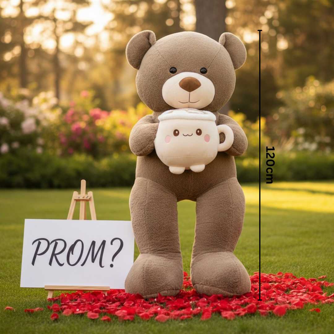 Mocha teddy bear standing in a garden with a smiling latte mug plush
