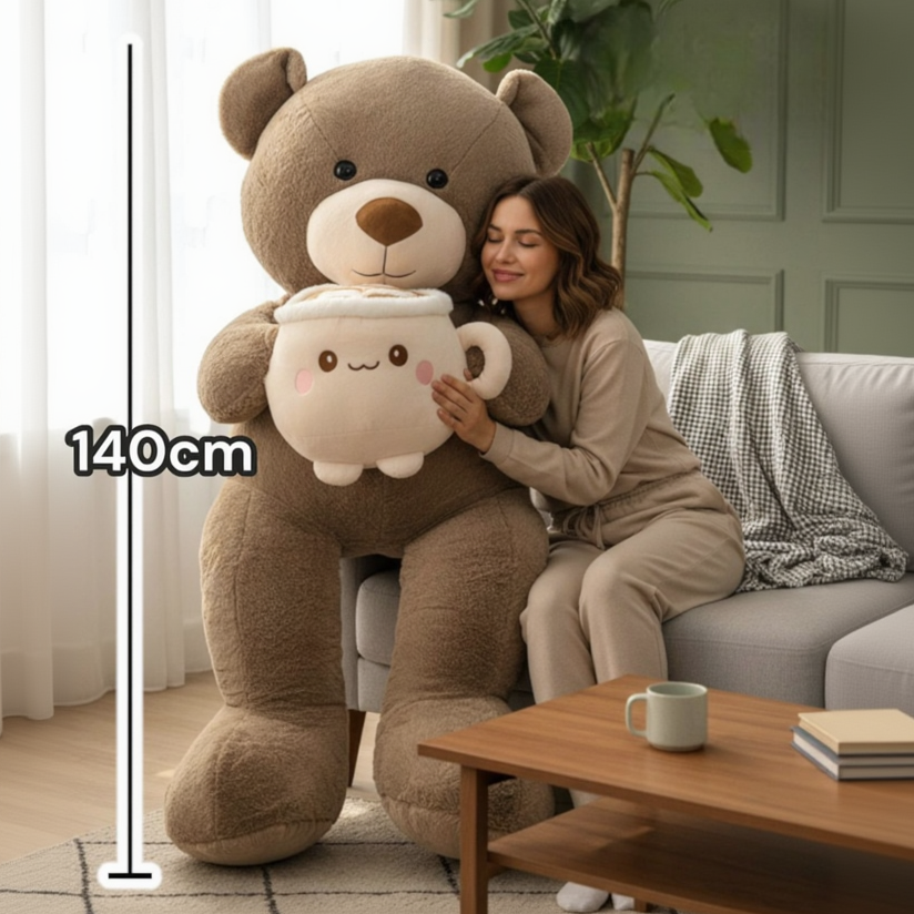 Mocha teddy bear hugging a latte mug plush beside a woman, with a 140cm line