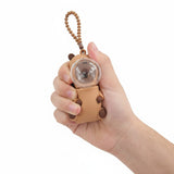 Capybara fidget keychain held in hand showing size