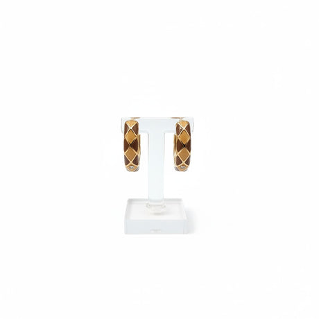 Caramel and cream harlequin enamel hoop earring detail