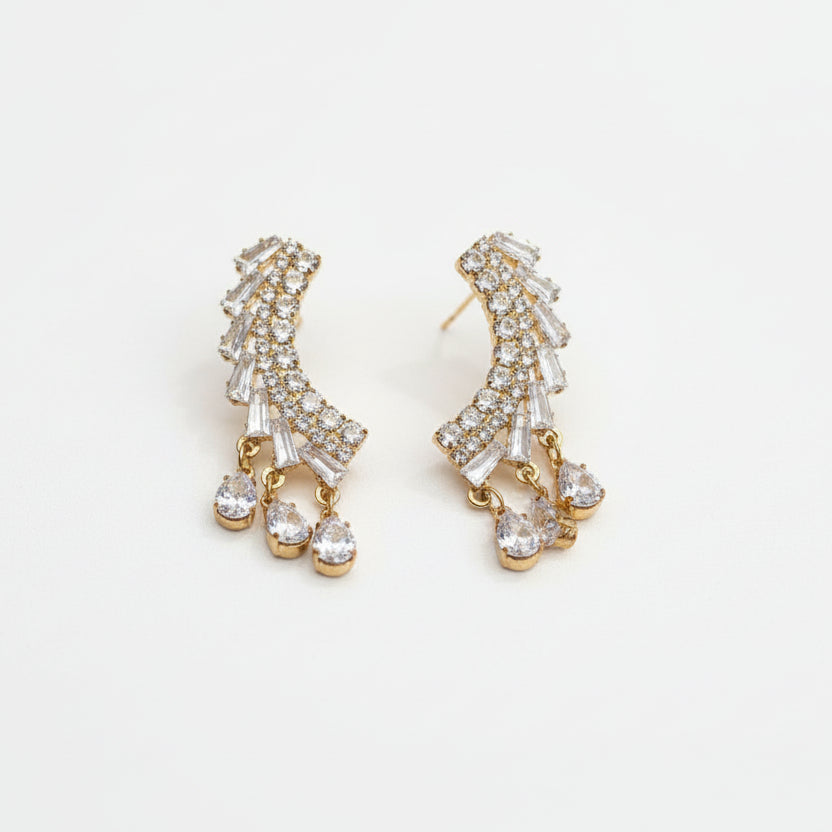 A pair of cascade drop earrings on a white background