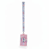 Pink trifold cat wallet with a 3D cat face in round sunglasses on a pastel printed neck lanyard