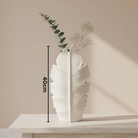 The taller leaf vase alone with eucalyptus and dried gypsophila, marked 40cm