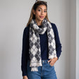 Charcoal and cream argyle diamond print scarf looped at the neck with short cream fringe