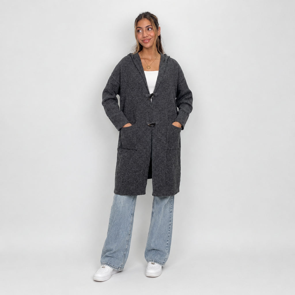Charcoal hooded toggle cardigan worn open over a white crop top and jeans