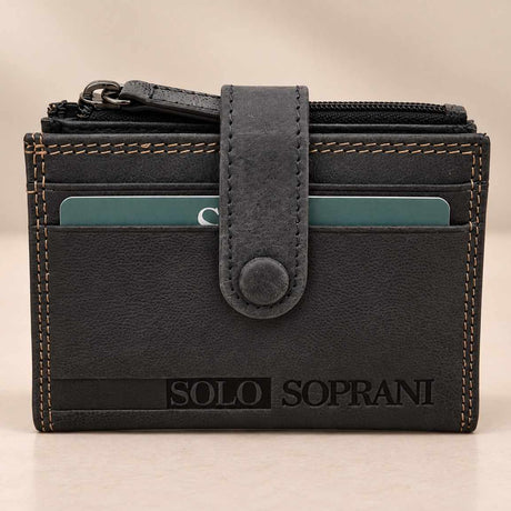 Closed slate grey compact wallet with a leather snap tab and top zip