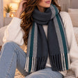 Charcoal blanket scarf with teal, grey and cream stripes and twisted tassels