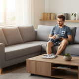 Checkered short pyjama set worn reading on a corner sofa