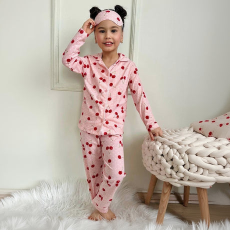 Girls pink cherry print pajama set with button up top, pants and eye mask