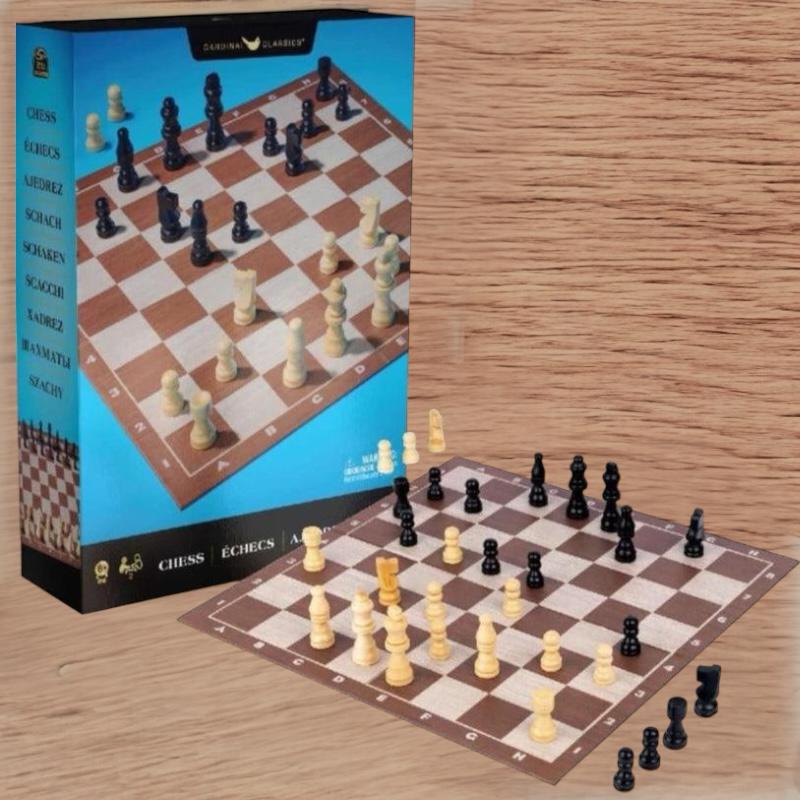 Chess board set up in front of its retail box on a wood grain background