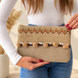 Beige clutch bag with multicolour chevron braid, crochet band and a row of beige pom poms