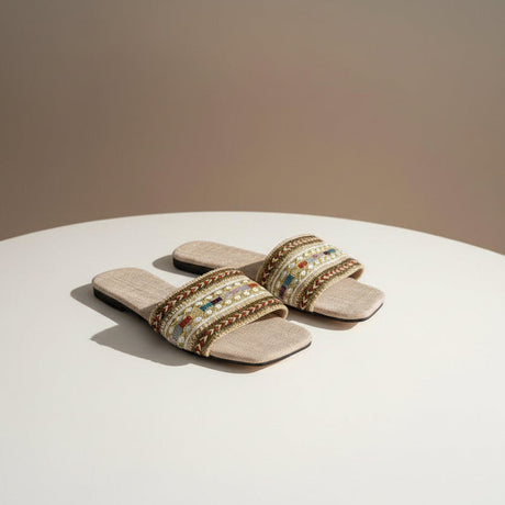Pair of linen slides side by side, braided cord edging along a woven striped band