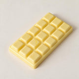 Cream white chocolate bar squishy shown at an angle on a plain light background