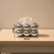 Decorative tissue holder with dimensions on a beige background