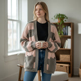 Pink stripes on taupe, cardigan styled with denim and a mug in hand