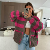 Taupe chunky knit cardigan with fuchsia stripes and patch pockets, mirror selfie