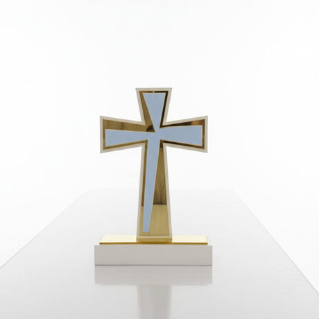 Blue panel framed by a broad polished gold border on a white block with a gold strip