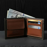 Open brown leather wallet with money and cards on a dark background