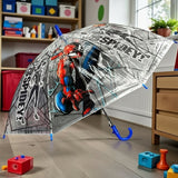 Transparent dome kids umbrella open on a floor with a Spiderman web print and blue handle