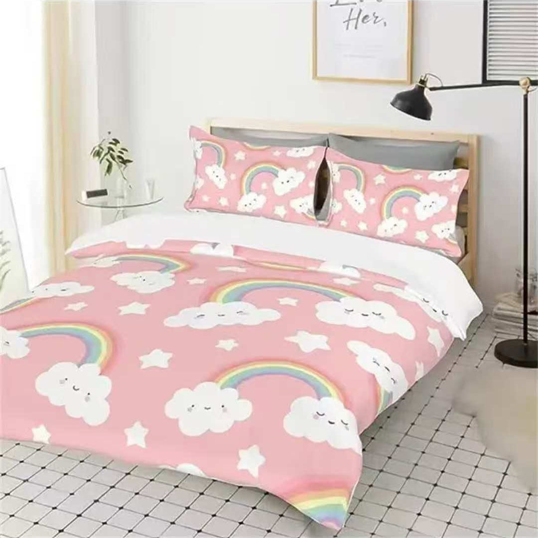 Pink kids bedding set with smiling clouds, rainbows and stars