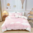 Soft pink cloud print bedding set for kids with white reversible underside