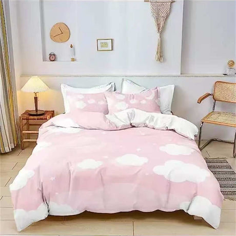 Soft pink cloud print bedding set for kids with white reversible underside