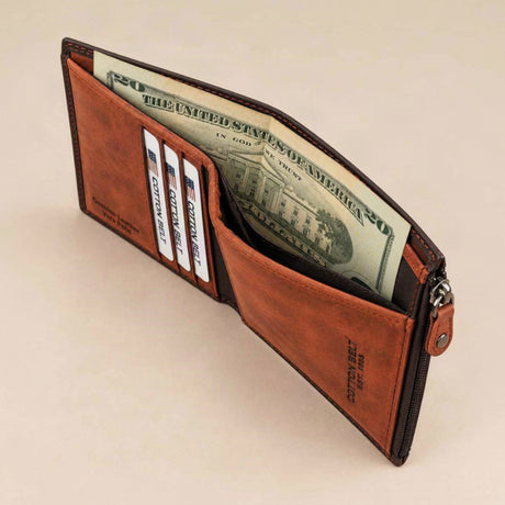 Top view of the tall cognac wallet holding banknotes in its full height pocket