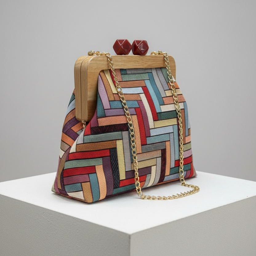 Colorful patterned handbag on a white background