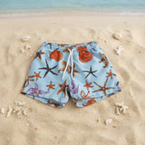 Light blue starfish and shell print boys swim shorts